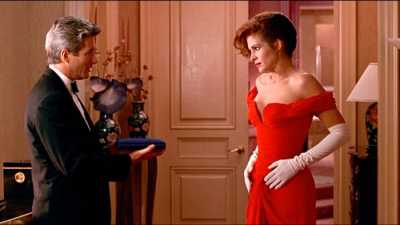 Джулии Робертс в вечернем красном платье до пола с открытым декольте и белыми перчатками в фильме красотка